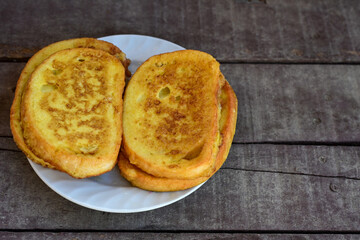 French toast  and white cheese. Rustic breakfast  made from deep fried   bread   with organic free range   eggs
