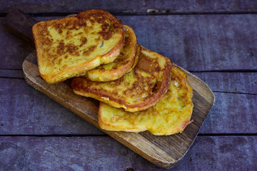 French toast  and white cheese. Rustic breakfast  made from deep fried   bread   with organic free range   eggs