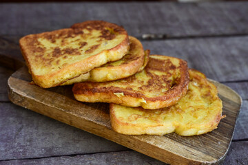 French toast  and white cheese. Rustic breakfast  made from deep fried   bread   with organic free range   eggs