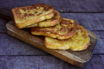 French toast  and white cheese. Rustic breakfast  made from deep fried   bread   with organic free range   eggs