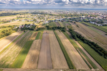 Aerial View of Farmland and Small Town, Poland &ndash; Patchwork Countryside Landscape