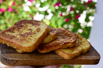 French toast  and white cheese. Rustic breakfast  made from deep fried   bread   with organic free range   eggs