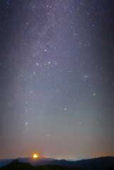 In the clear dawn before sunrise, the autumn constellations rise. (cassiopeia, andromeda, perseus and milky way)