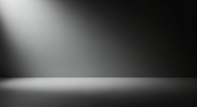 Empty black and white studio room with single bright spotlight illuminating corner. Background for product display.