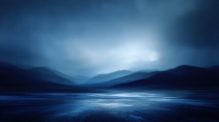 A dark blue, atmospheric landscape with silhouetted mountains, a reflective foreground, and a luminous sky. Moody and abstract, evoking a sense of mystery and calm, blurred blue background
