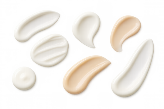 Cosmetic cream product swatches on transparent background, showing different textures and shades for cosmetics and skincare