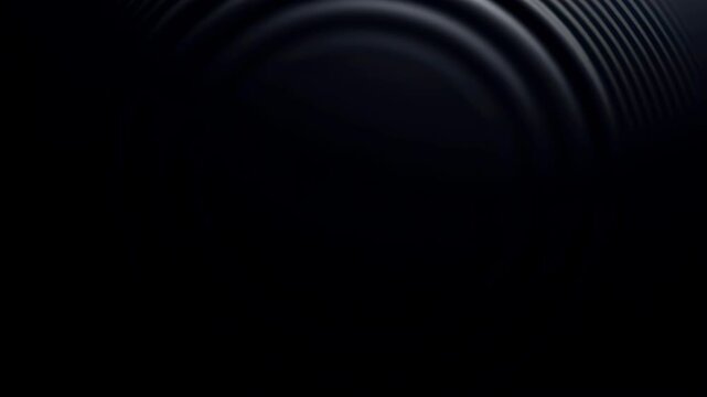 Abstract dark background with subtle concentric circles creating a ripple effect this minimal and elegant design represents sound waves vibration or a gentle impact on a liquid surface