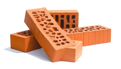 Red bricks arranged on white background