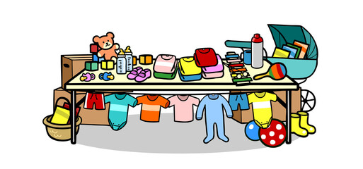 Fototapeta na wymiar Voller Tisch mit gebrauchten Kindersachen als Stand für Kinderflohmarkt