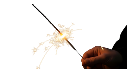 A hand holding a lit sparkler against a white background, creating a burst of light and sparks.