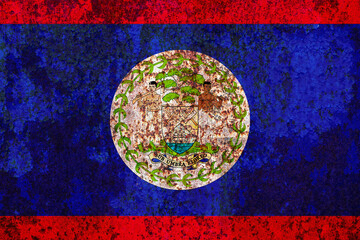 Textured Belize flag with distressed surface showing the national colors of red and blue and...