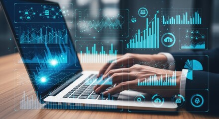 Business professional typing on laptop with holographic data visualization floating above screen. Digital analytics dashboards show charts, graphs, network connections in cyan blue.