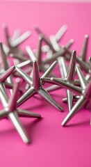 Small Metal Star-Shaped Decorations.