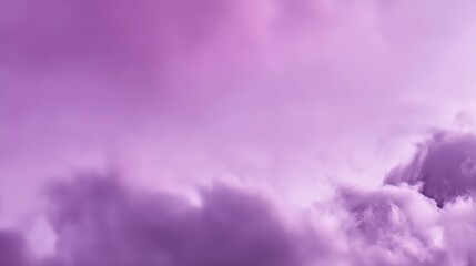 Fototapeta premium A beautiful, vibrant sky filled with soft, voluminous clouds in shades of purple, lavender, and pink, creating an ethereal and dreamy atmospheric background, blurred purple background