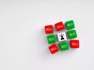 Confused businessman deciding whether to buy or sell during stock market volatility