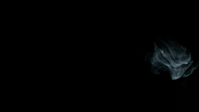 White smoke effect on black background