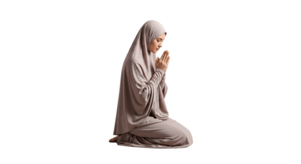 Muslim Woman Praying in Traditional Islamic Attire.