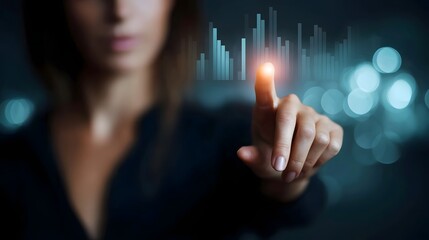 A woman s finger touches a glowing futuristic interface displaying business analytics charts