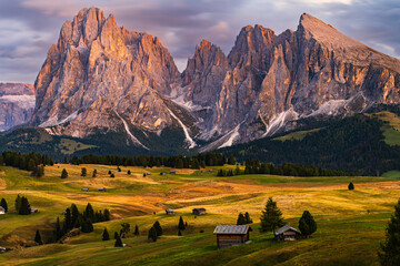The UNESCO site Seiser Alm or Alpe di Siusi the Dolomite plateau and the largest high-elevation Alpine meadow in Europe located in Italy's South Tyrol province in the Dolomites in autumn sunset.
