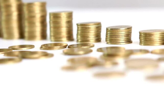 rows of coins for finance and business concept Stack of golden coin on table background and business or finance saving money