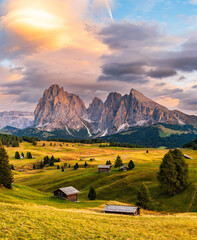 The UNESCO site Seiser Alm or Alpe di Siusi the Dolomite plateau and the largest high-elevation Alpine meadow in Europe located in Italy's South Tyrol province in the Dolomites in autumn sunset.