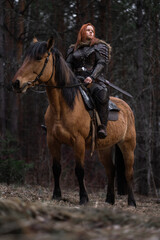 Fototapeta premium Red-haired warrior sits atop a majestic horse amidst a dark forest setting.