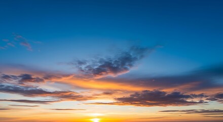 Fototapeta premium Vibrant Sunset Sky with Clouds and Golden Light.