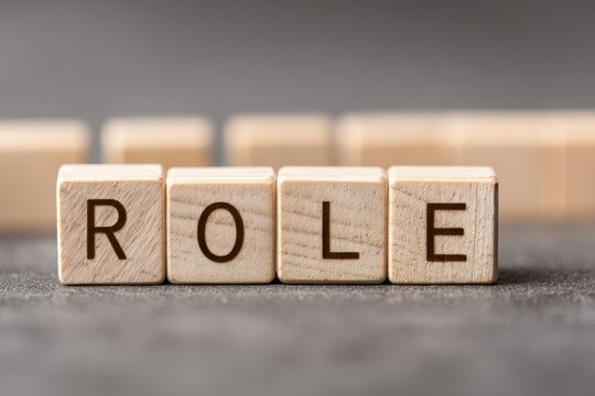 Creative Wooden Cubes Displaying Business Agenda Concepts on a Subtle Gray Canvas