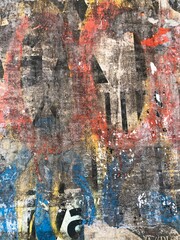 Colorful peeling posters distressed paper texture graffiti detail urban decay wallpaper background	street-art
