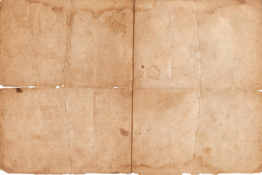 Distressed Old Paper Texture Background. Old vintage paper folded in four. Brown crumpled and folded parchment rustic paper sheet with space for text
