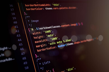 Close-up of CSS-in-JS image styling code with responsive properties like width, height, margin, and border radius, representing modern frontend UI development and clean visual layout design.