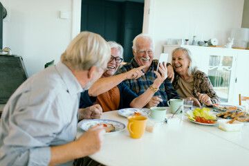 Seniors enjoying a meal together