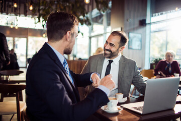 Business meeting in a caf?