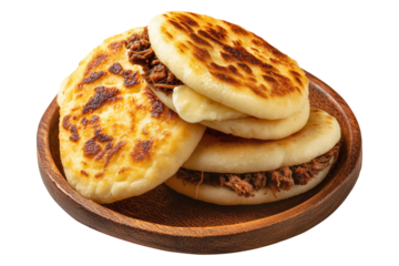 Grilled arepas plain sandwich filled with melted cheese and ground beef on wooden plate, isolated on white transparent background, concept of Latin street food