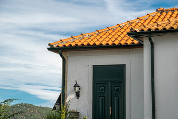 White house with tiled roof, vila pouca do aguiar, portugal