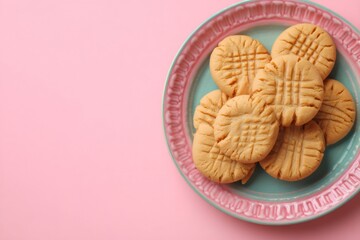 Peanut butter cookies on a decorative plate, offering homemade dessert, classic sweet baked snack food