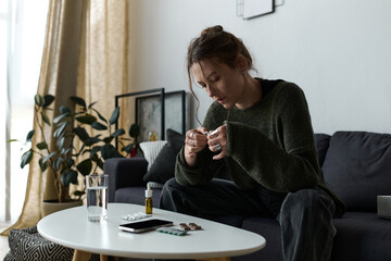 Struggles of a young woman finding solace in her home during difficult times