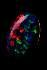 Rare Black Opal from Lightning Ridge with Intense Multicolor Fire Under Macro Lens