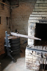A Set of Traditional Air Bellows on a Blacksmith Hearth.