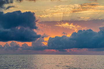 Shot of the dramatic sunset by the beach. Nature