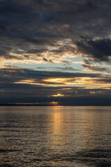 sunset over Lake Constance / Bodensee in Bregenz Vorarlberg Austria with clouds and intense colours and blue sky