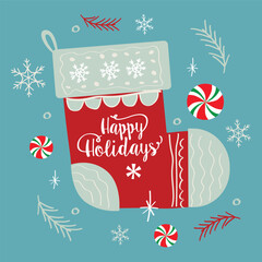 happy holidays text in red christmas socks and christmas ball ornament