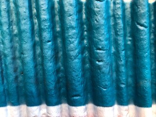 Textured 3d wall blue and white street-art graffiti paint wallpaper background web texture