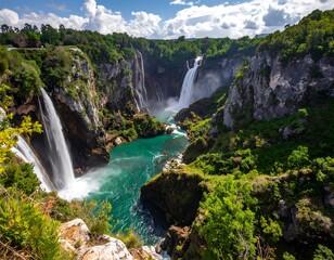 Obraz premium Majestic waterfalls cascading into a vibrant emerald pool