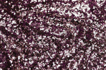 Obraz premium Close-up of shimmering dark fuchsia spangle fabric with sequins creating a sparkling texture, perfect for fashion, textiles, and luxury design backgrounds.