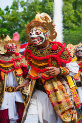 Wayang Topeng dancer in traditional Balinese White Monkey Hanuman costume and mask - character of Bali culture. Ritual dance at ceremony on religious holiday. Ethnic festival, art of Indonesian people