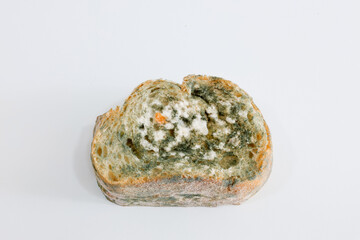 Close-up of Moldy bread on cutting board