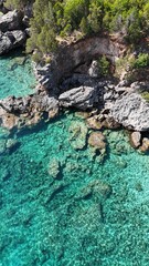 Stunning beaches, turquoise water and green islands in the Ionian Sea around Ithaka and Kefalonia, Greece