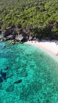 Stunning beaches, turquoise water and green islands in the Ionian Sea around Ithaka and Kefalonia, Greece