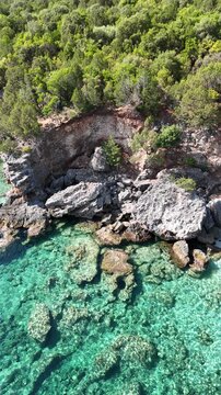Stunning beaches, turquoise water and green islands in the Ionian Sea around Ithaka and Kefalonia, Greece